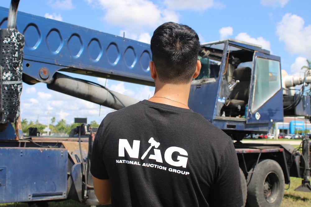 NAG Auction logo on a shirt